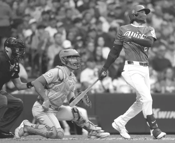 Brewers subdued in clinching Friday